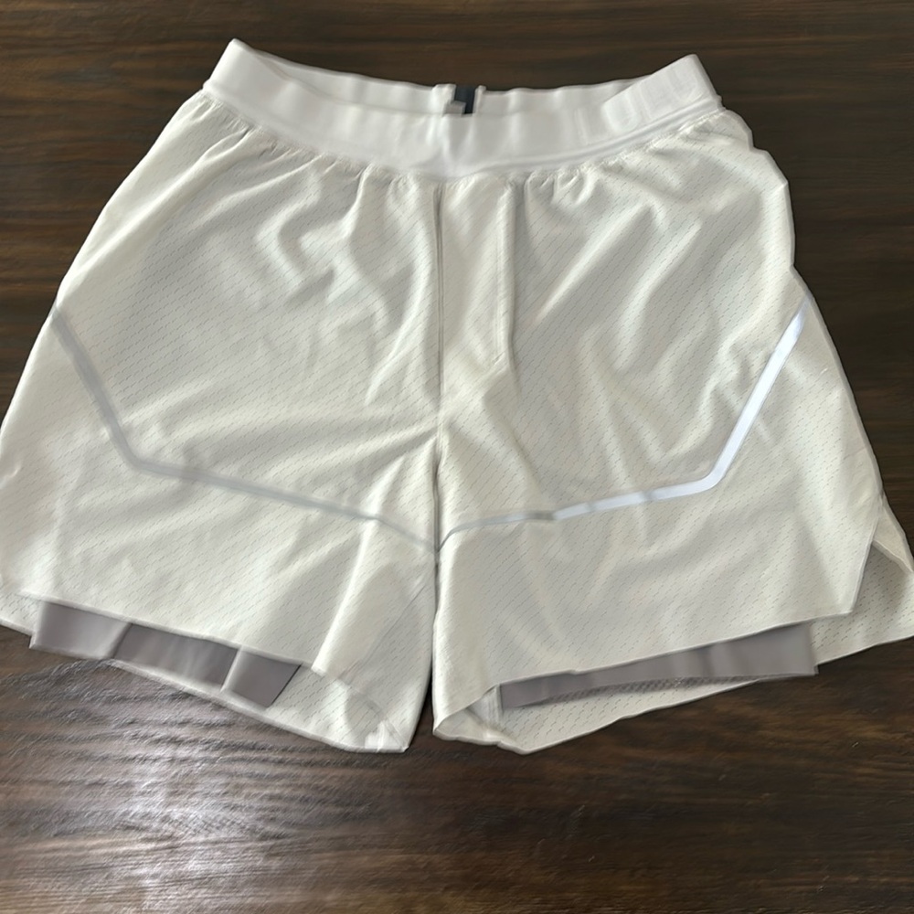 Lulu running shorts, Medium 6” inseam.
